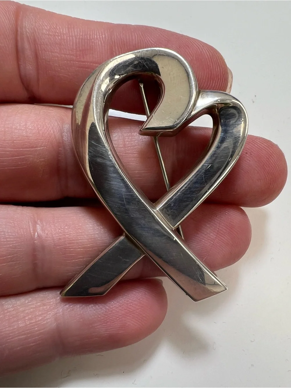 Tiffany & Co. Paloma Picasso Loving Heart Brooch in polished sterling silver